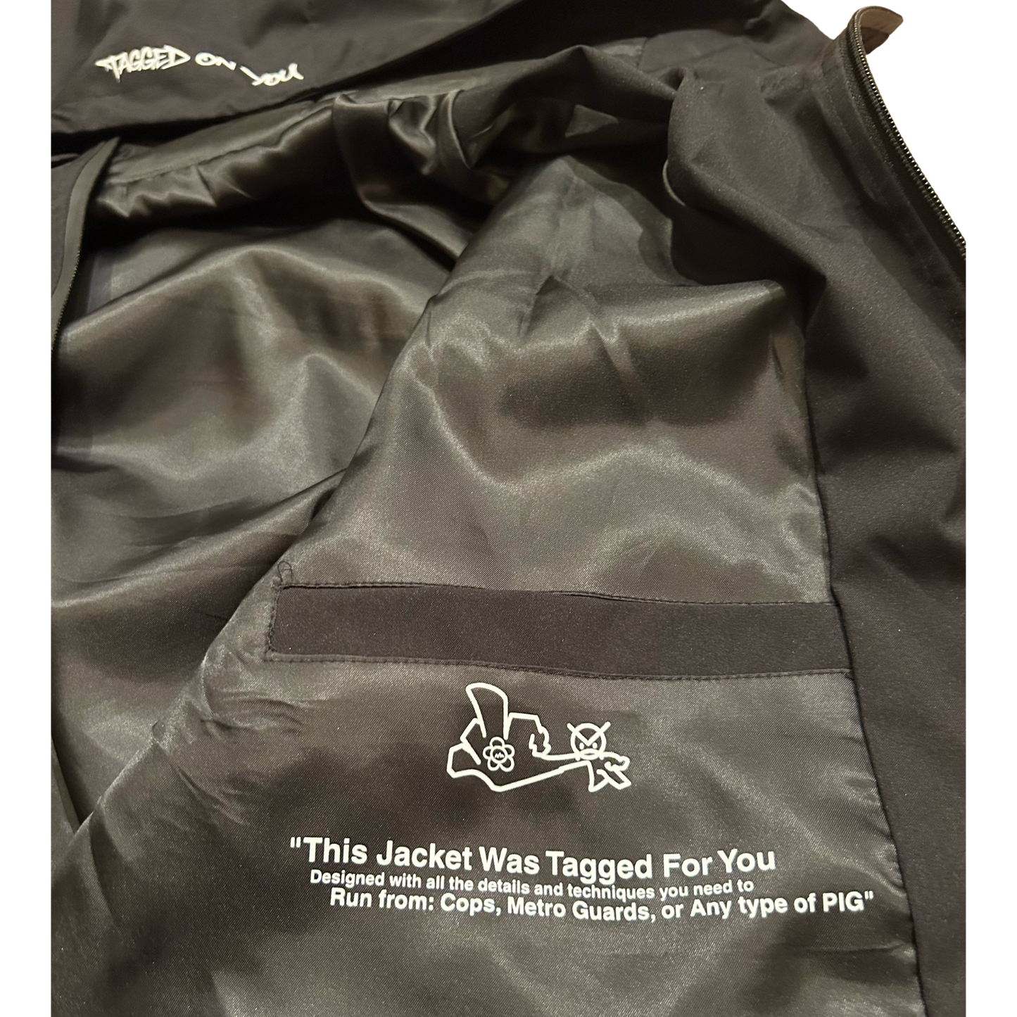 TECHNICAL RAIN JACKET